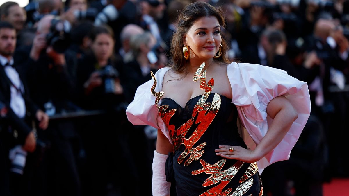 A regular at the Cannes Film Festival for the past two decades, Aishwarya struck a pose in the monochrome gown adorned with 3D metallic elements and golden accents.