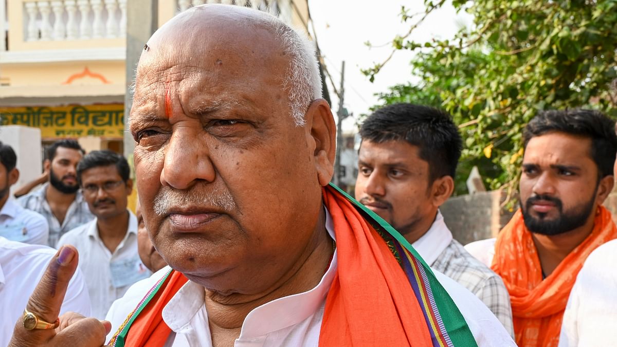 BJP candidate from Faizabad constituency Lallu Singh shows his inked finger after casting his vote for the fifth phase of Lok Sabha elections, in Ayodhya.