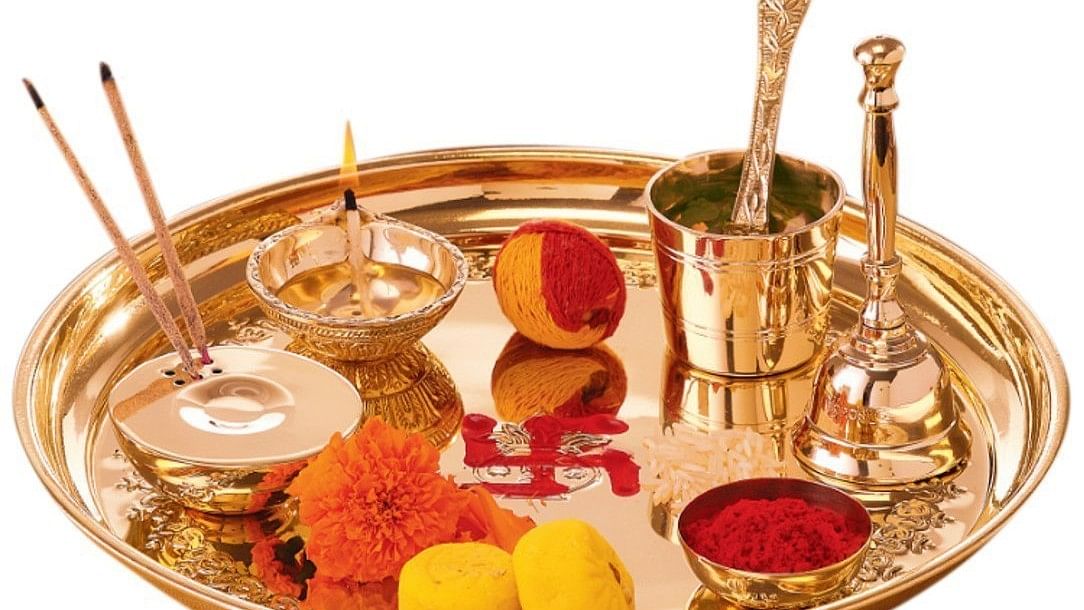 Puja Items: Stocking up on puja essentials such as incense sticks, camphor, diyas, flowers, and holy books on this day yield eternal rewards.