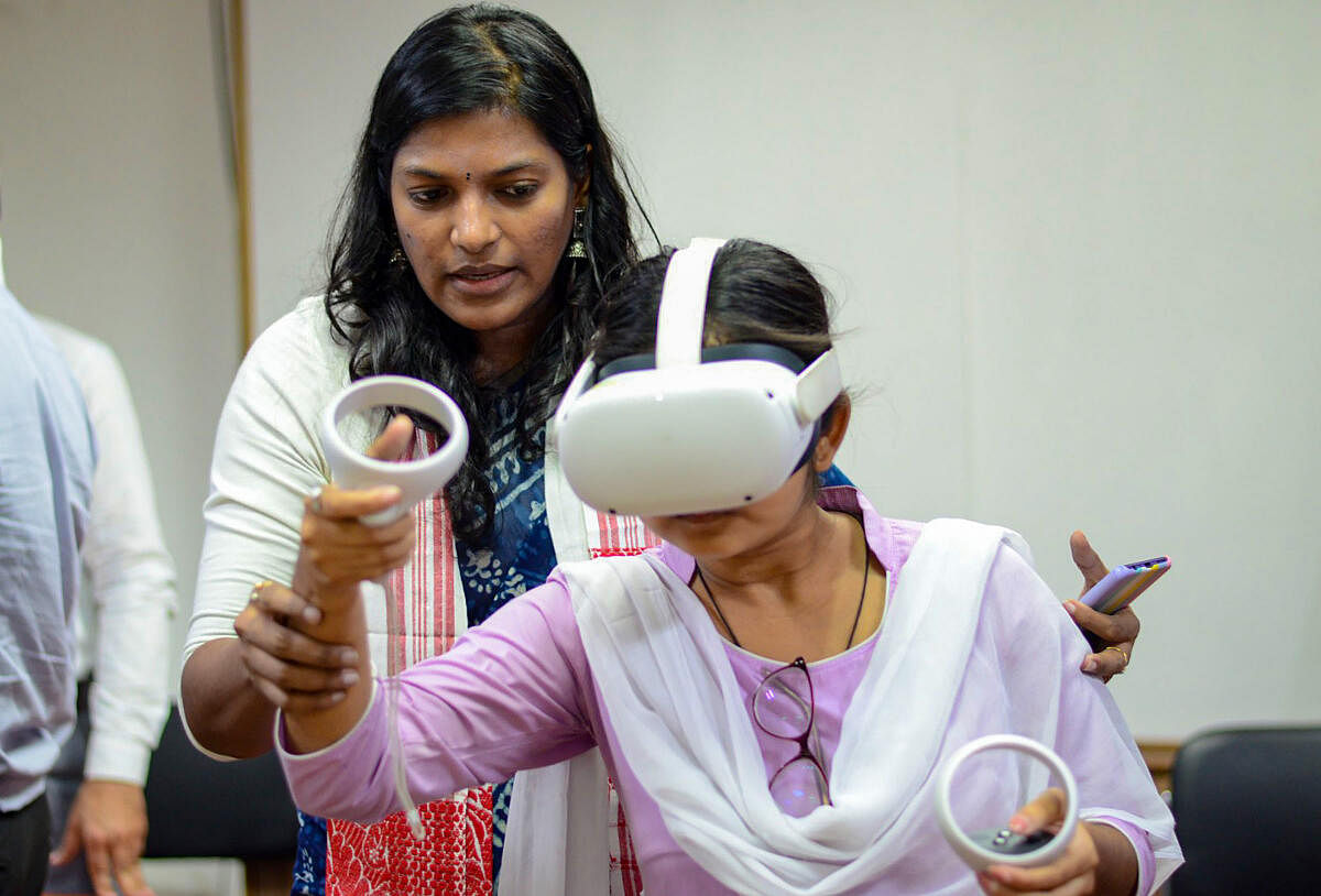 Officials during a trial for voting using virtual reality technology, in Kamrup district.