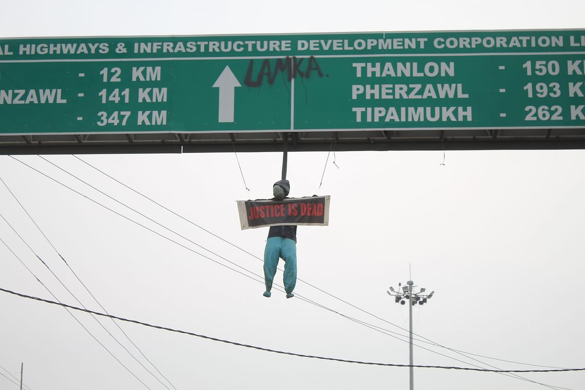  An effigy hung from a signboard in Churachandpur. The name 'Lamka', as the Kuki community locally refers to Churachandpur, can be seen spray-painted on the board. 