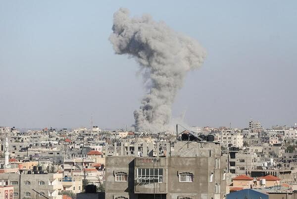 Smoke rises following Israeli strikes, amid the ongoing conflict between Israel and the Palestinian Islamist group Hamas, in Rafah,