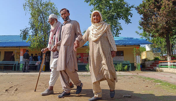 Elderly people leave after casting votes at a polling station during sixth phase of Lok Sabha polls, at Dhangri village in Rajouri district of Jammu and Kashmir on Saturday, May 25, 2024.