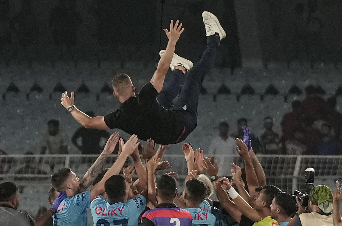 Mumbai City FC players celebrate after winning the Indian Super League (ISL) 2023-24 final match over Mohun Bagan Super Giants.