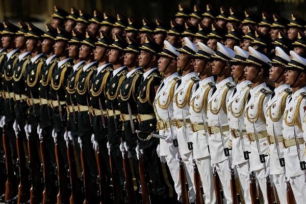 Honour guard members stand during a welcome ceremony for President of Equatorial Guinea Teodoro Obiang Nguema Mbasogo at the Great Hall of the People in Beijing, China May 28, 2024.