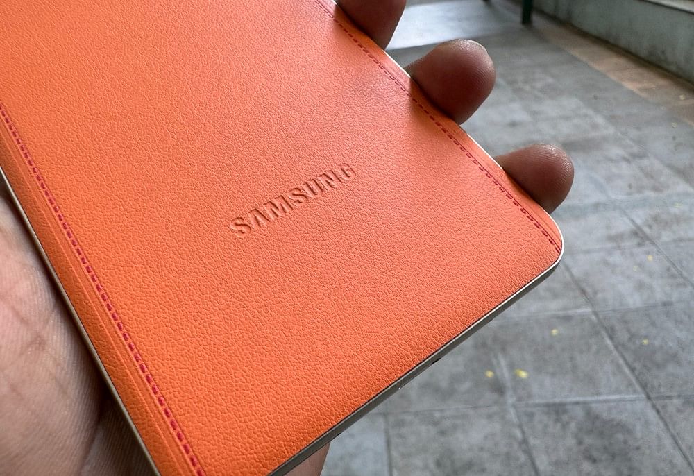 Samsung Galaxy F55 with saddle stitching design on the back.