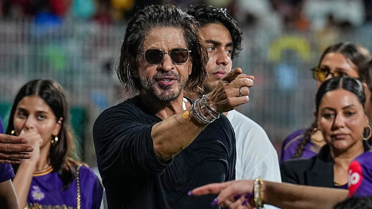 Shah Rukh Khan gets clicked during the victory lap after his team KKR's victory.