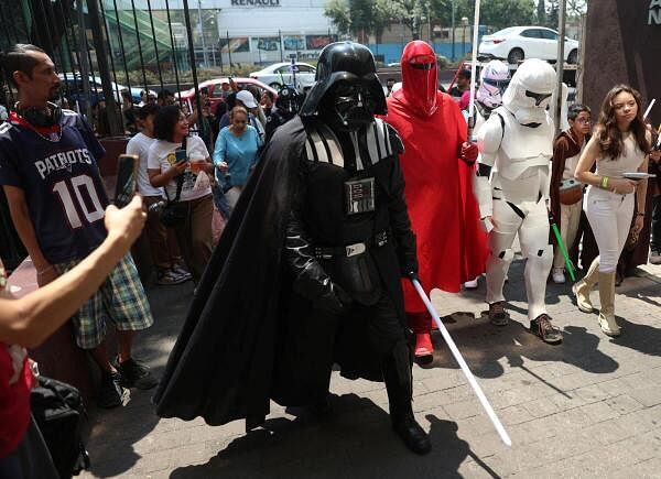 Fans of the Star Wars film franchise take part in an event marking Star Wars Day, in Mexico City, Mexico.