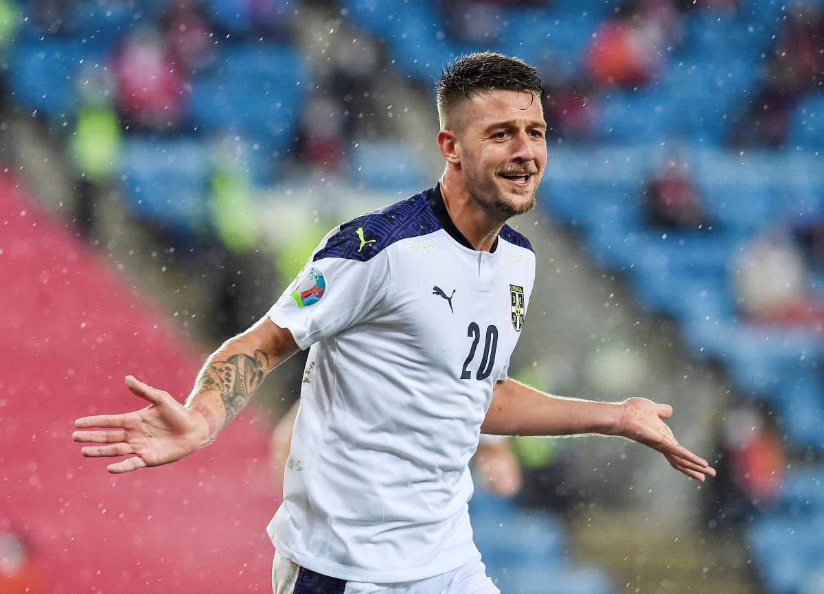 Serbia's Sergej Milinkovic-Savic celebrates after scoring a goal.