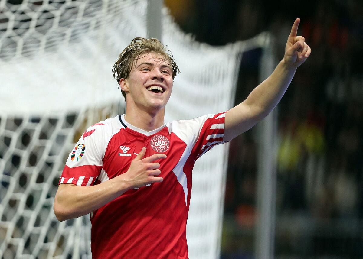 Denmark's Rasmus Højlund celebrates scoring a goal.