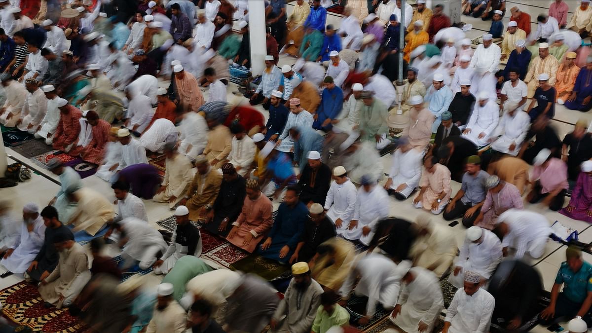 Muslims attend Eid-ul-Adha prayer at the Baitul Mukarram National Mosque in Dhaka, Bangladesh.