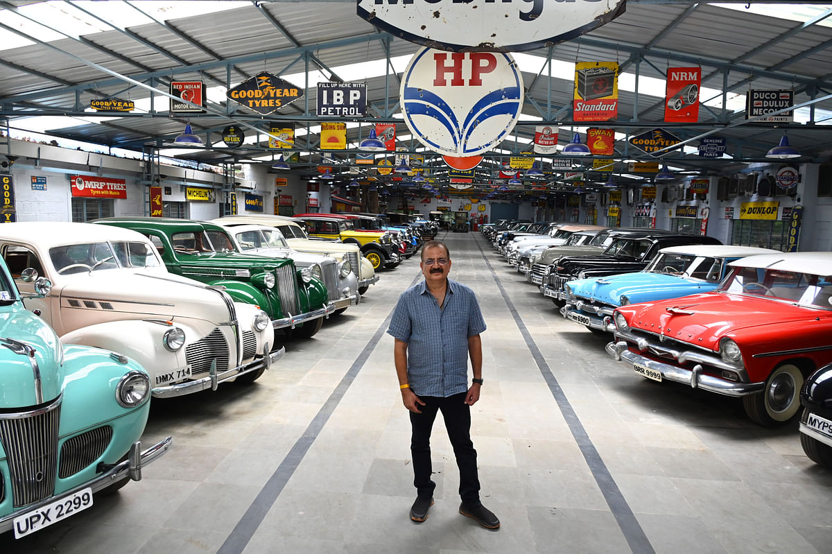 The author at his garage which houses cars dating back to 1909. 