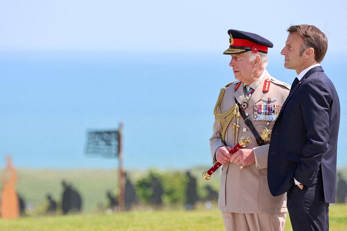 Britain's King Charles and President of France, Emmanuel Macron attend the UK Ministry of Defence and the Royal British Legion's commemorative event at the British Normandy Memorial to mark the 80th anniversary of D-Day in Ver-Sur-Mer, France, June 6, 2024.