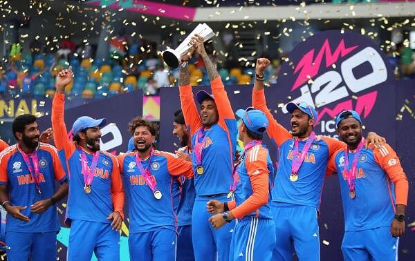 Surya Kumar Yadav lifts the trophy after his splendid fielding contributed to India's victory at the T20 World Cup. When the equation came down to 16 off the last six balls, on the first ball SKY took a sensational relay catch at the long-off boundary off Hardik Pandya to put India on the cusp of a thrilling victory.
