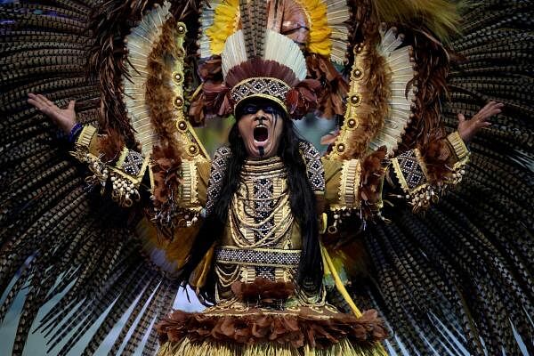 A reveller of the Boi Caprichoso Association performs during the annual Parintins folklore festival at the Bumbodromo in Parintins, Amazonas state, Brazil 