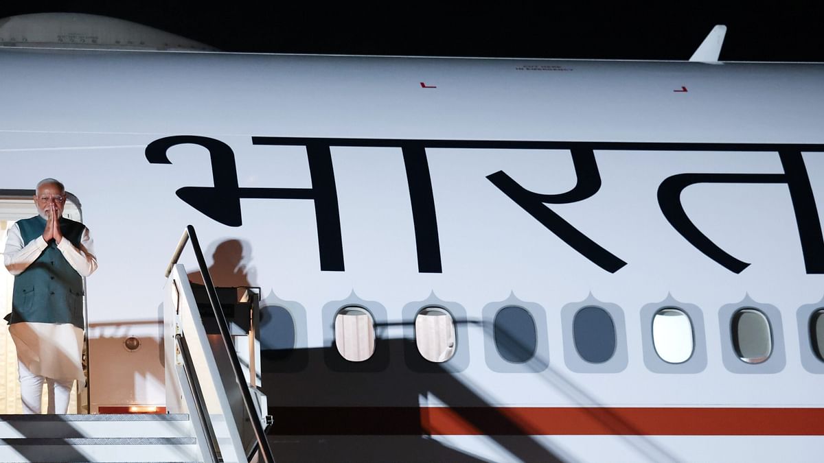 Prime Minister Narendra Modi gestures as he arrives at Brindisi Airport in Italy to participate in the G7 Summit.