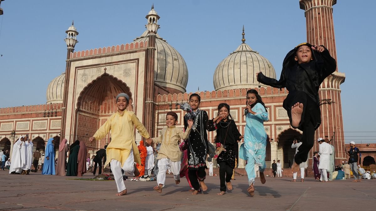 Children celebrate  'Eid ul-Adha', at Jama Masjid in New Delhi.