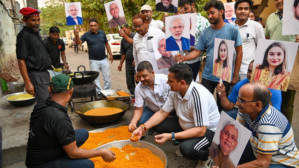 NDA supporters prepare sweets on the eve of the results of Lok Sabha elections, in Patna.