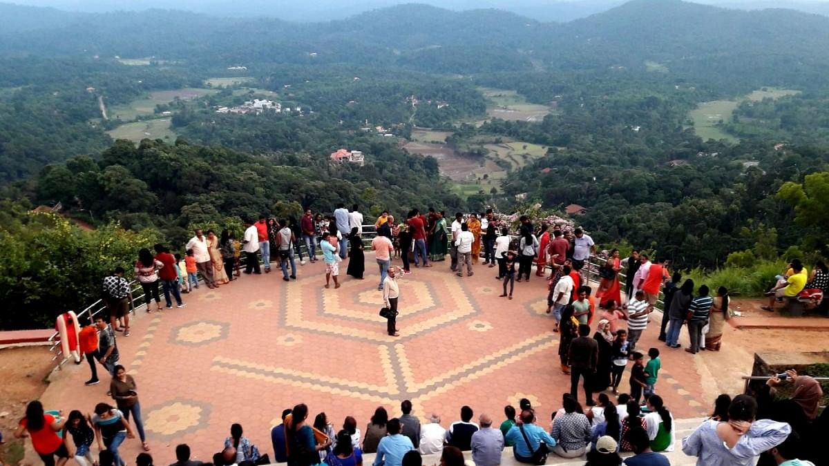 Madikeri, often called the "Scotland of India,"  is situated in the heart of Coorg, a perfect location for those seeking a peaceful escape amidst nature. The hill station is covered with tea and coffee plantations, and the rain makes these hills shine with a lush green glow that is awe-inspiring. The Scotland of India remains a tourist favourite for its stunning weather, magnificent views, and charming locals.