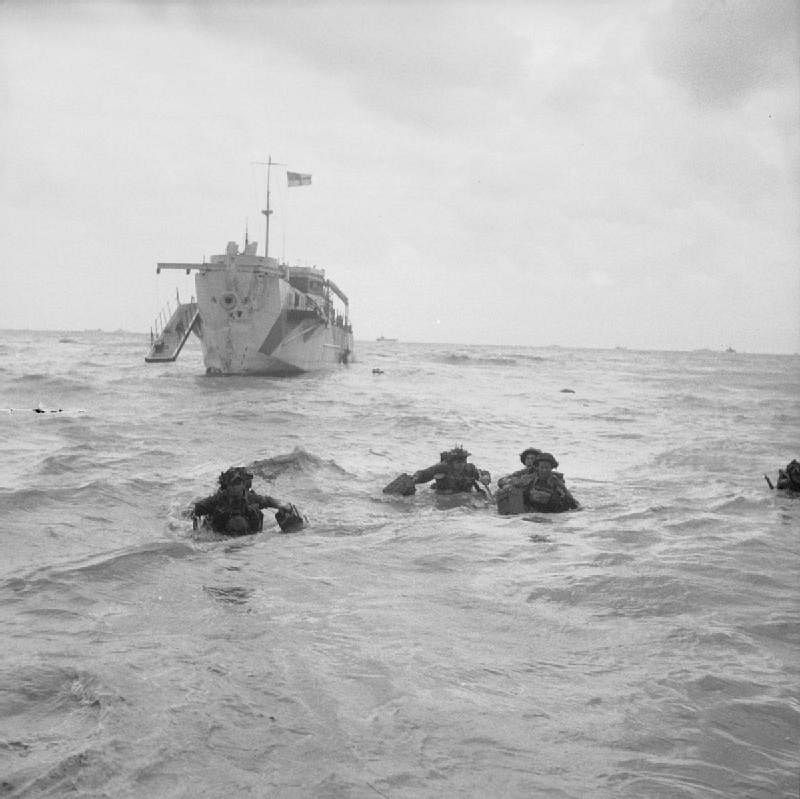 Troops wading ashore, June 6, 1944.
