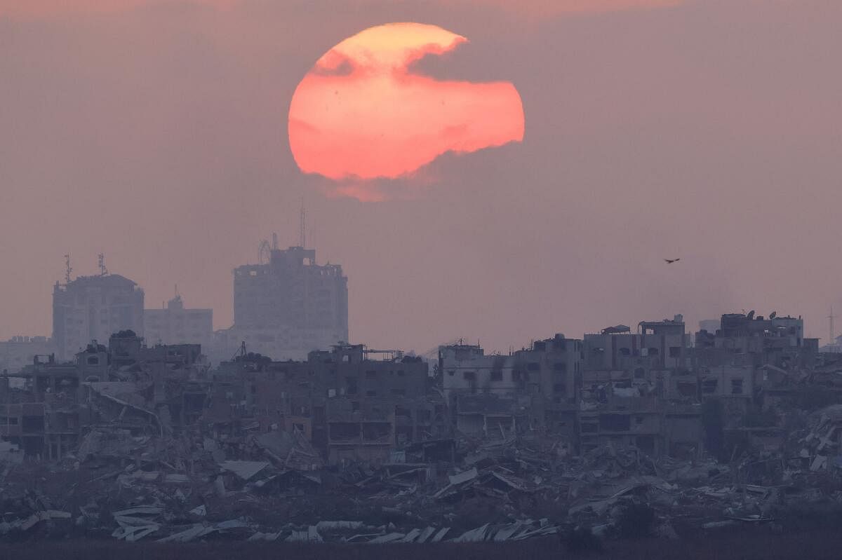 The sun sets over Gaza, amid the Israel-Hamas conflict, as seen from Israel, June 27, 2024.