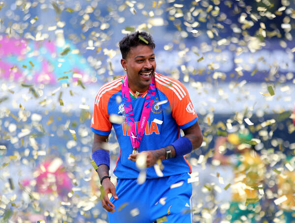 Hardik Pandya celebrates with his medal after winning the T20 World Cup.