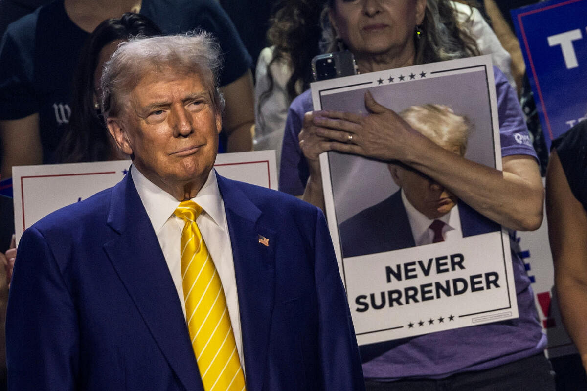 Republican presidential candidate and former U.S. President Donald Trump looks on as he arrives to deliver a campaign speech during a Turning Point USA event at the Dream City Church in Phoenix, Arizona, U.S., June 6, 2024.