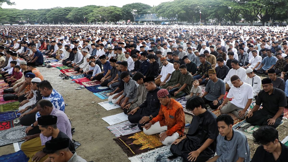 Muslims offer mass prayers during Eid ul-Adha celebrations in Banda Aceh, Indonesia.