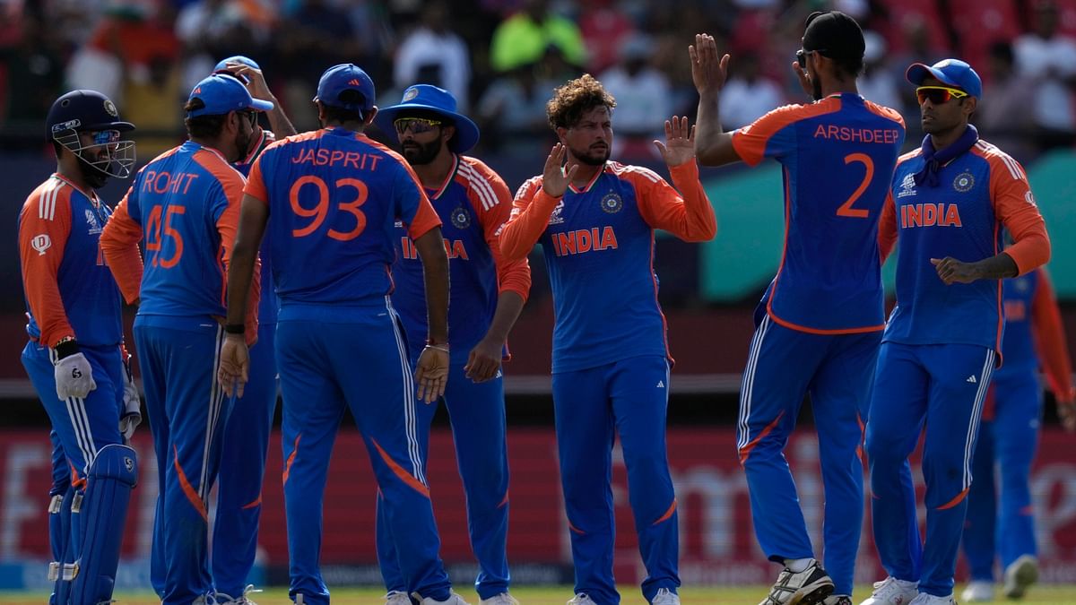 Left-arm spinners Kuldeep Yadav and Axar Patel took three wickets each as Team India thrashed defending champions England by 68 runs in Guyana to set up a T20 World Cup final against South Africa.