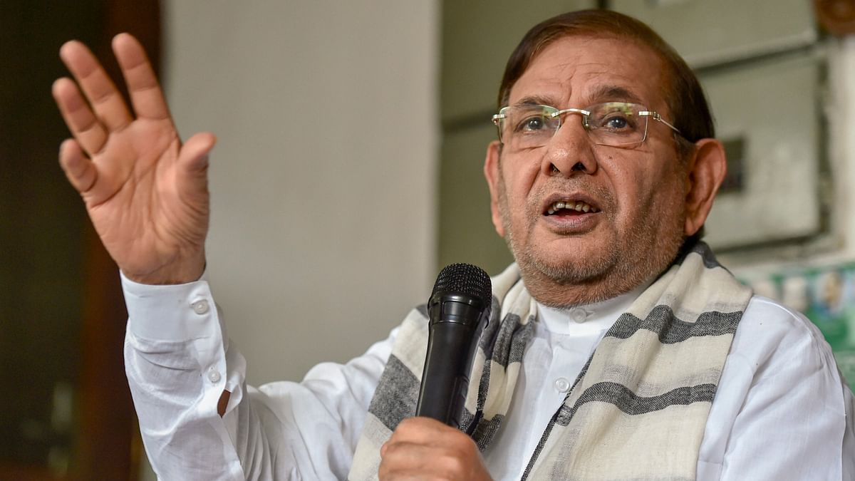 Former Union Minister Sharad Yadav faced the heat as he was slapped by Arvinder Singh, a local transporter, at a public function in Delhi on November 24, 2011.