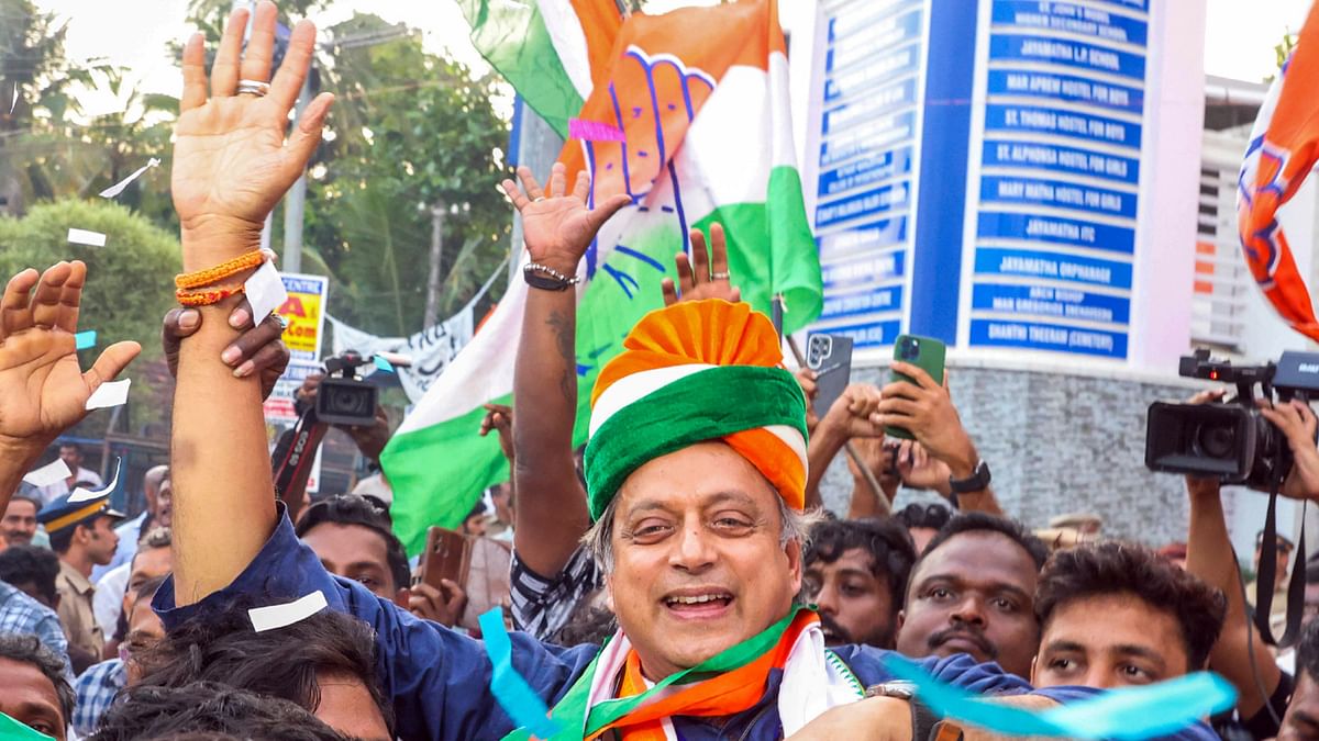 Congress leader and UDF candidate from Thiruvananthapuram constituency Shashi Tharoor celebrates with supporters after winning the Lok Sabha elections, in Thiruvananthapuram.