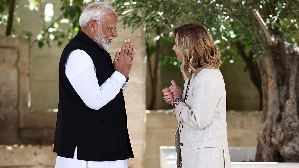 Prime Minister Narendra Modi is welcomed by Italian Prime Minister Giorgia Meloni on the second day of the G7 summit, at the Borgo Egnazia resort, in Savelletri, Italy.