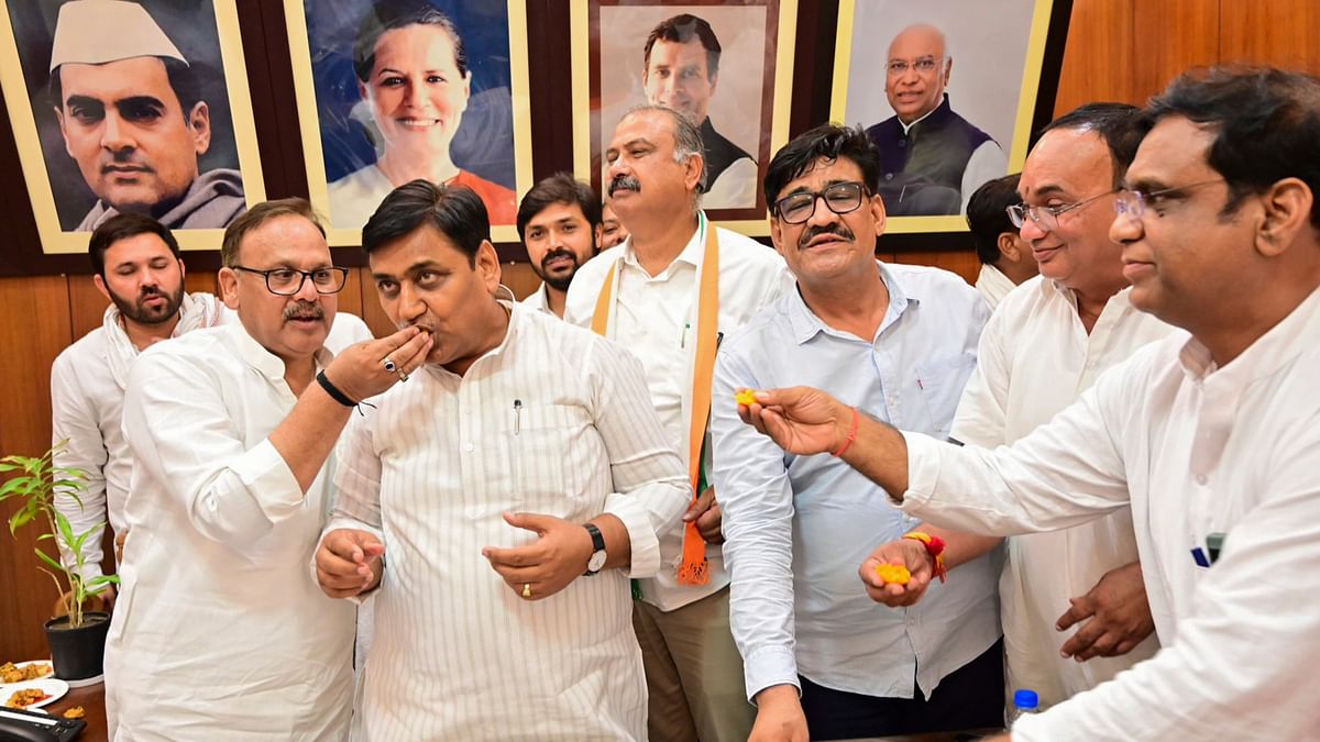 Rajasthan Congress chief Govind Singh Dotasra with party leader celebrates their performance in Lok Sabha elections.