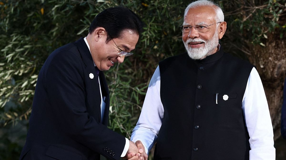 Prime Minister Narendra Modi shakes hands with Japan’s Prime Minister Fumio Kishida at the G7 summit at the Borgo Egnazia resort, in Savelletri, Italy.