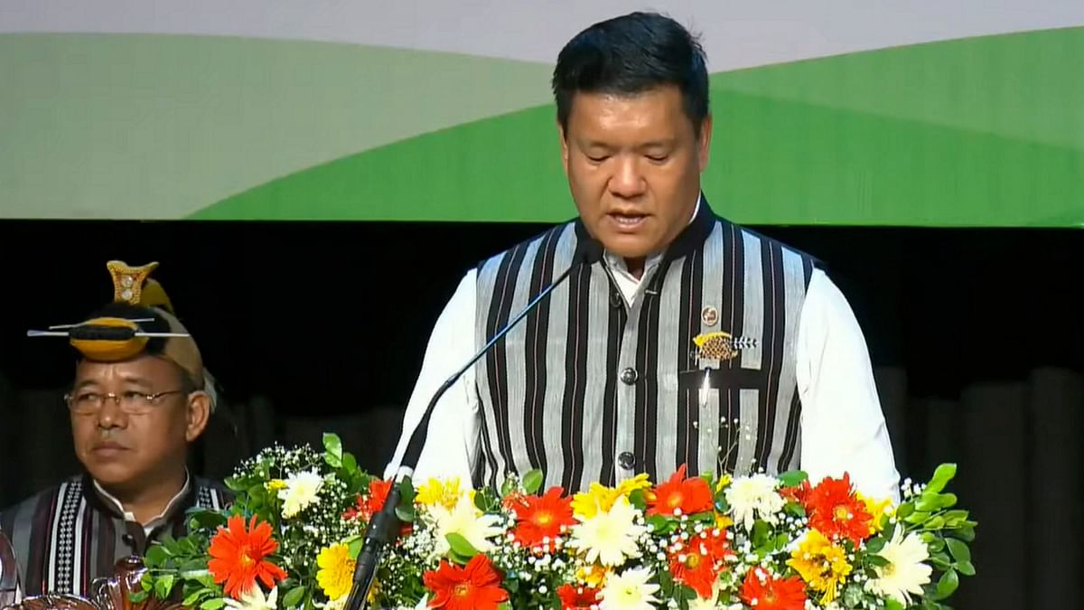 Arunachal Pradesh Chief Minister-designate Pema Khandu takes oath for the third consecutive term at the DK State Convention Centre in Itanagar.