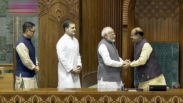 Prime Minister Narendra Modi greets Om Birla after the latter was elected as the Speaker of the House during the first session of the 18th Lok Sabha, in New Delhi. 