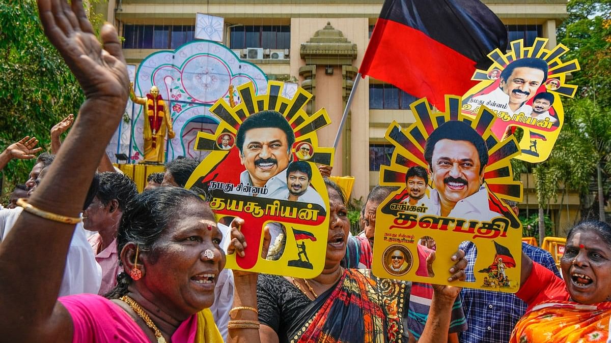 DMK supporters celebrate the party's lead during counting of votes for Lok Sabha elections, at party headquarters, Anna Arivalayam, in Chennai.