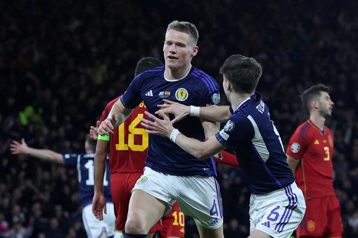 Scotland's Scott McTominay celebrates scoring their second goal against Spain.