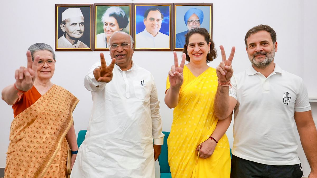 Congress President Mallikarjun Kharge and party leaders Sonia Gandhi, Rahul Gandhi and Priyanka Gandhi Vadra flash victory sign after their party's performance in the Lok Sabha elections.