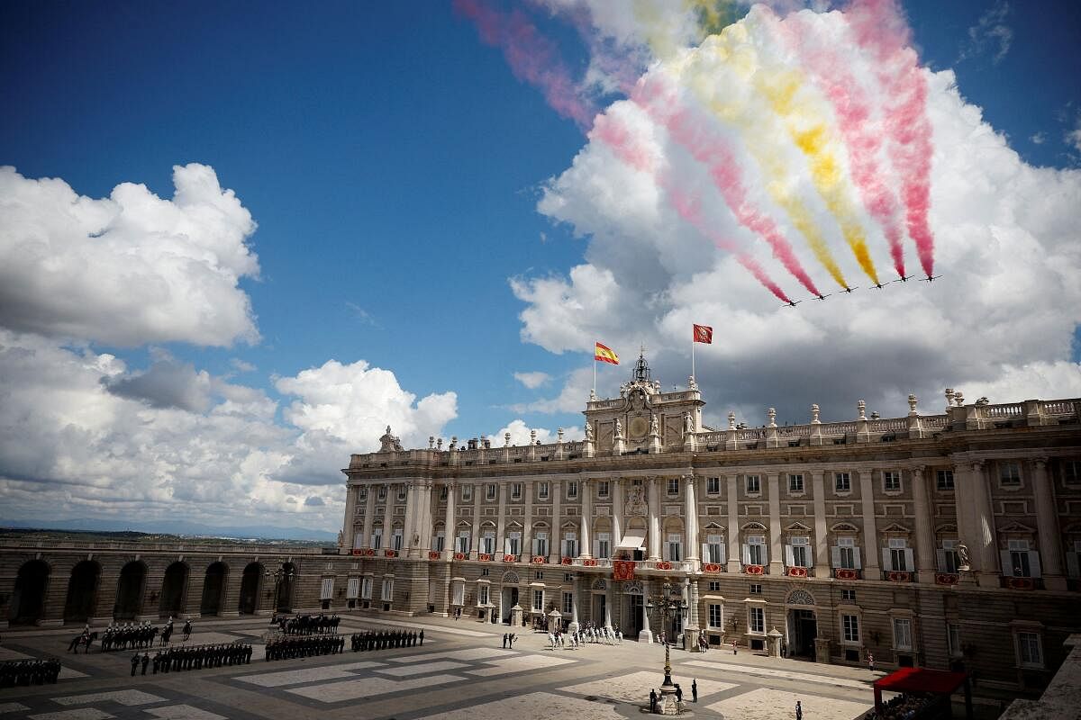 The aerobatic team "Patrulla Aguila" (Eagle Patrol) of the Spanish Air and Space Force flies past the Royal Palace during commemorations marking the 10th anniversary of the proclamation of Spain's King Felipe VI, in Madrid, Spain, June 19, 2024. 