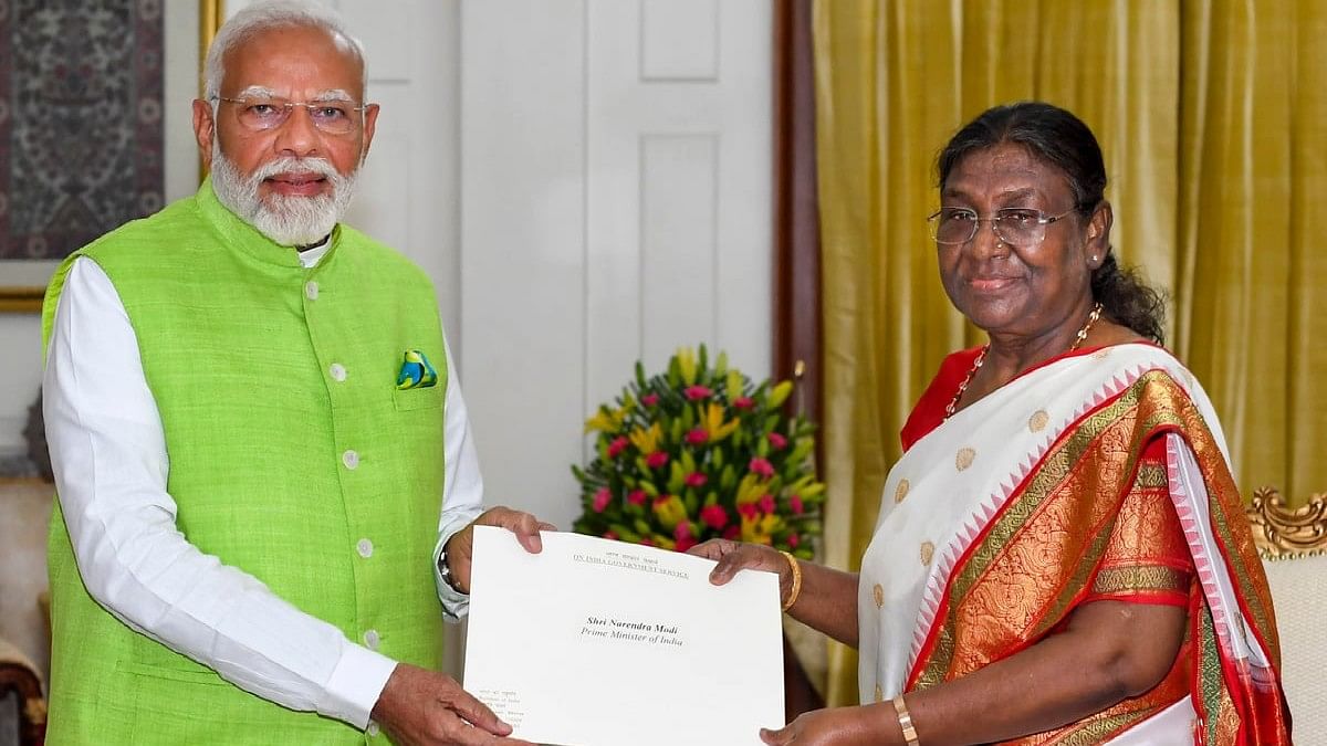 Prime Minister Narendra Modi tenders his resignation letter to President Droupadi Murmu as the 17th Lok Sabha comes to an end, at Rashtrapati Bhavan, in New Delhi