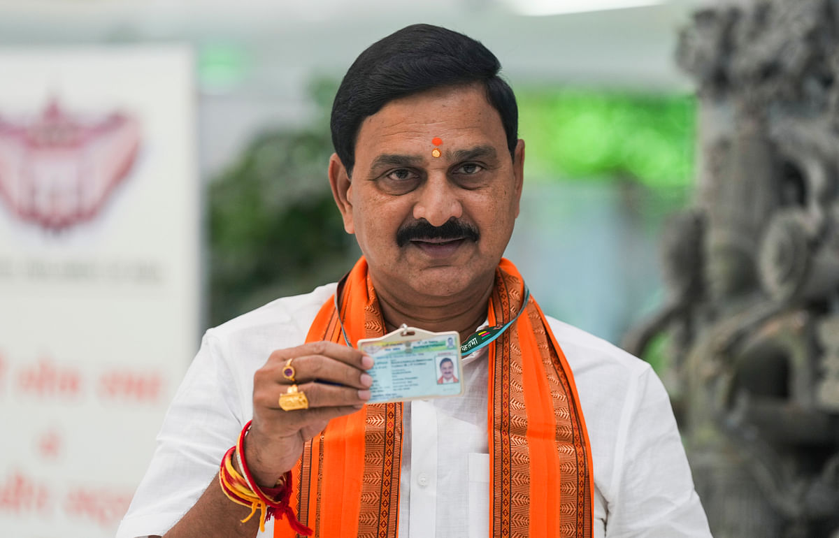 Newly elected member Bhupathiraju Srinivasa shows his identity card during the registration process of the members of the 18th Lok Sabha, in New Delhi,. 