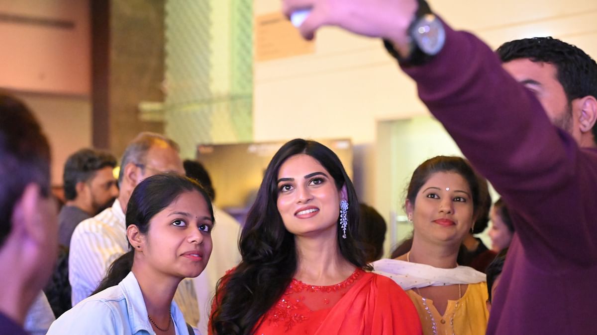 Actress Moksha Kushal poses for a selfie during the premiere of Kotee in Bengaluru.