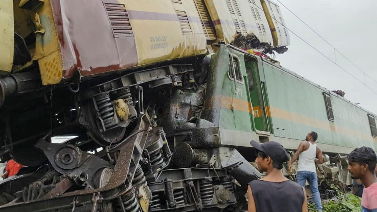 Mangled remains of the Kanchanjungha Express and a goods train after a collision between them, near Rangapani railway station, in West Bengal.