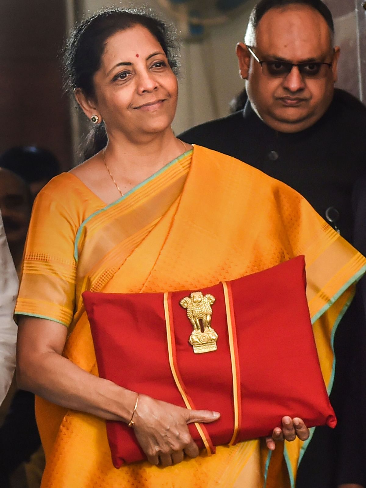 Union Budget 2020-21: Symbolising hope and prosperity amid the Covid-19 Pandemic, FM Sitharaman presented her second Budget in a yellow silk saree.