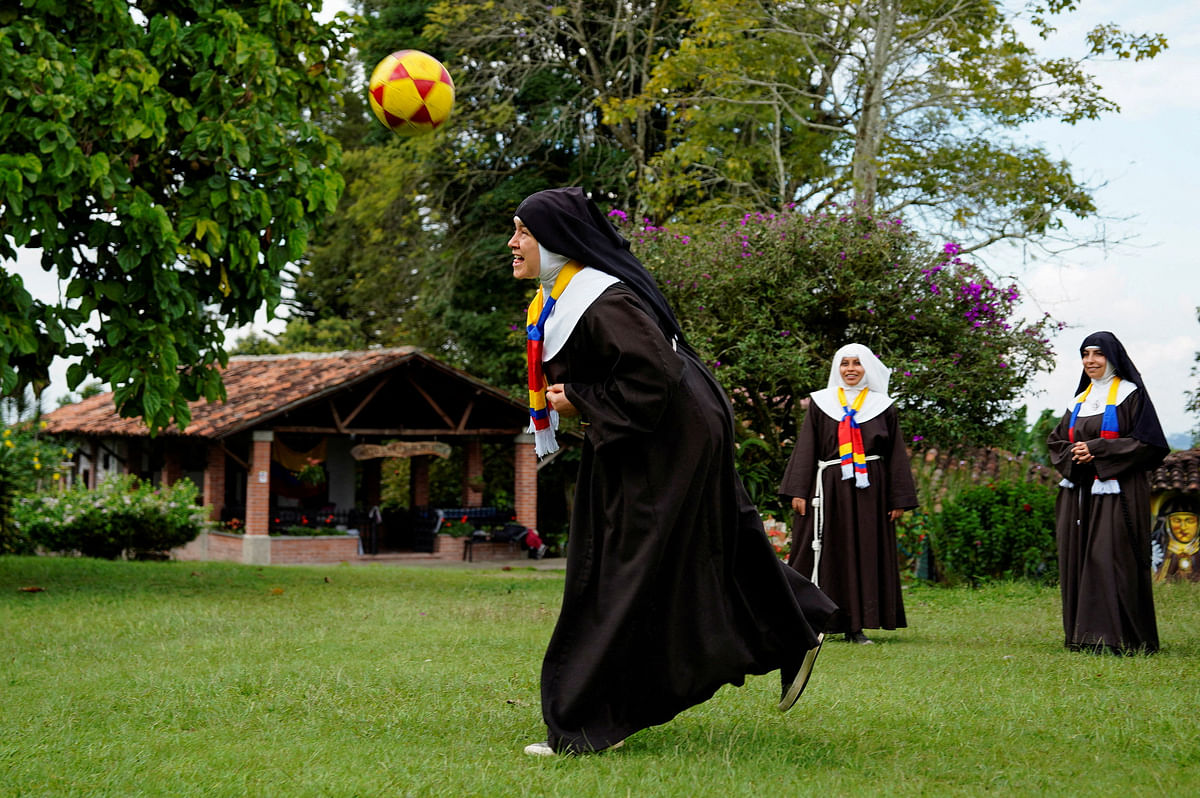 Poor Clare Sisters play soccer as they support the Colombian national team in the Copa America final against Argentina, at a convent in Montenegro, Colombia July 13, 2024.