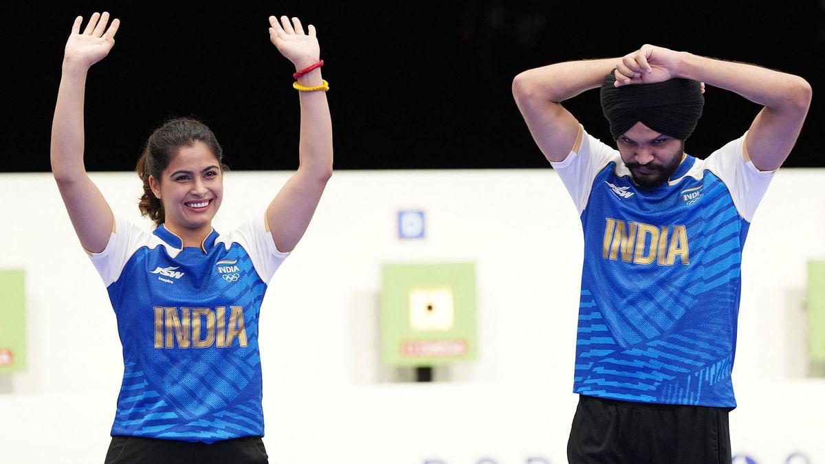 Manu Bhaker and Sarabjot Singh celebrate their win.