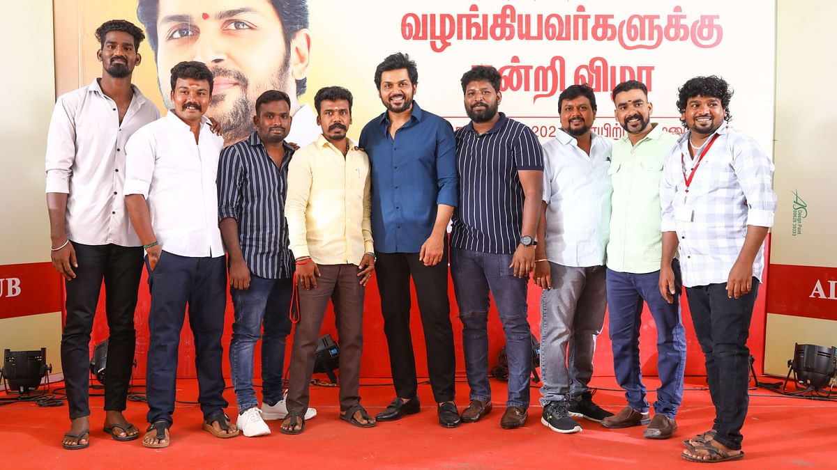 Karthi poses with his fans during a meet-and-greet event in Chennai.