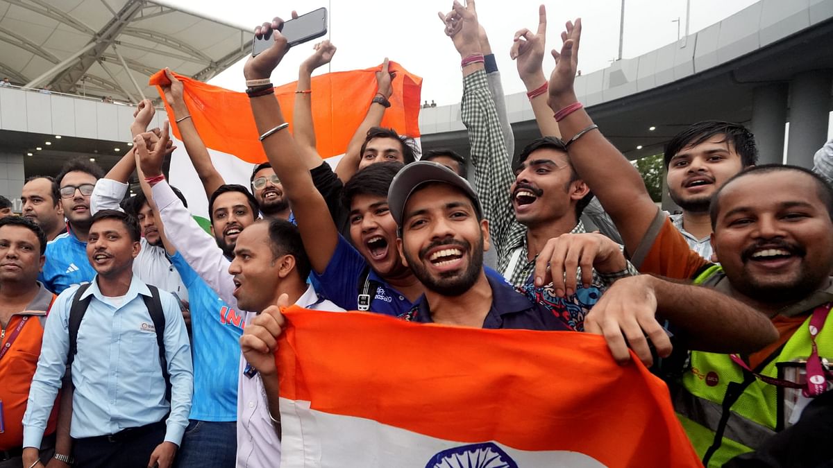 Fans gather to welcome the T20 World Cup-winning Indian cricket team at New Delhi airport.
