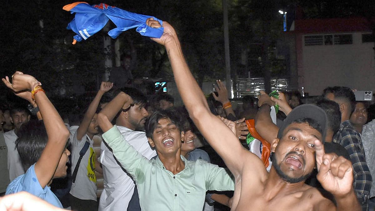 Fans in Bhopal celebrate Team India's historic win.